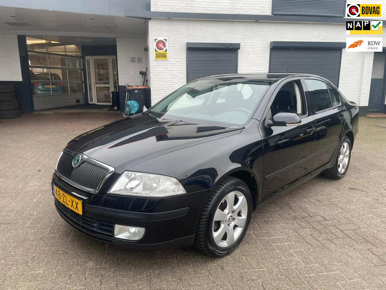 Skoda Octavia - 1.6 FSI Ambiente Attractive Business 1.6 FSI Ambiente Attractive Business - AutoWereld.nl