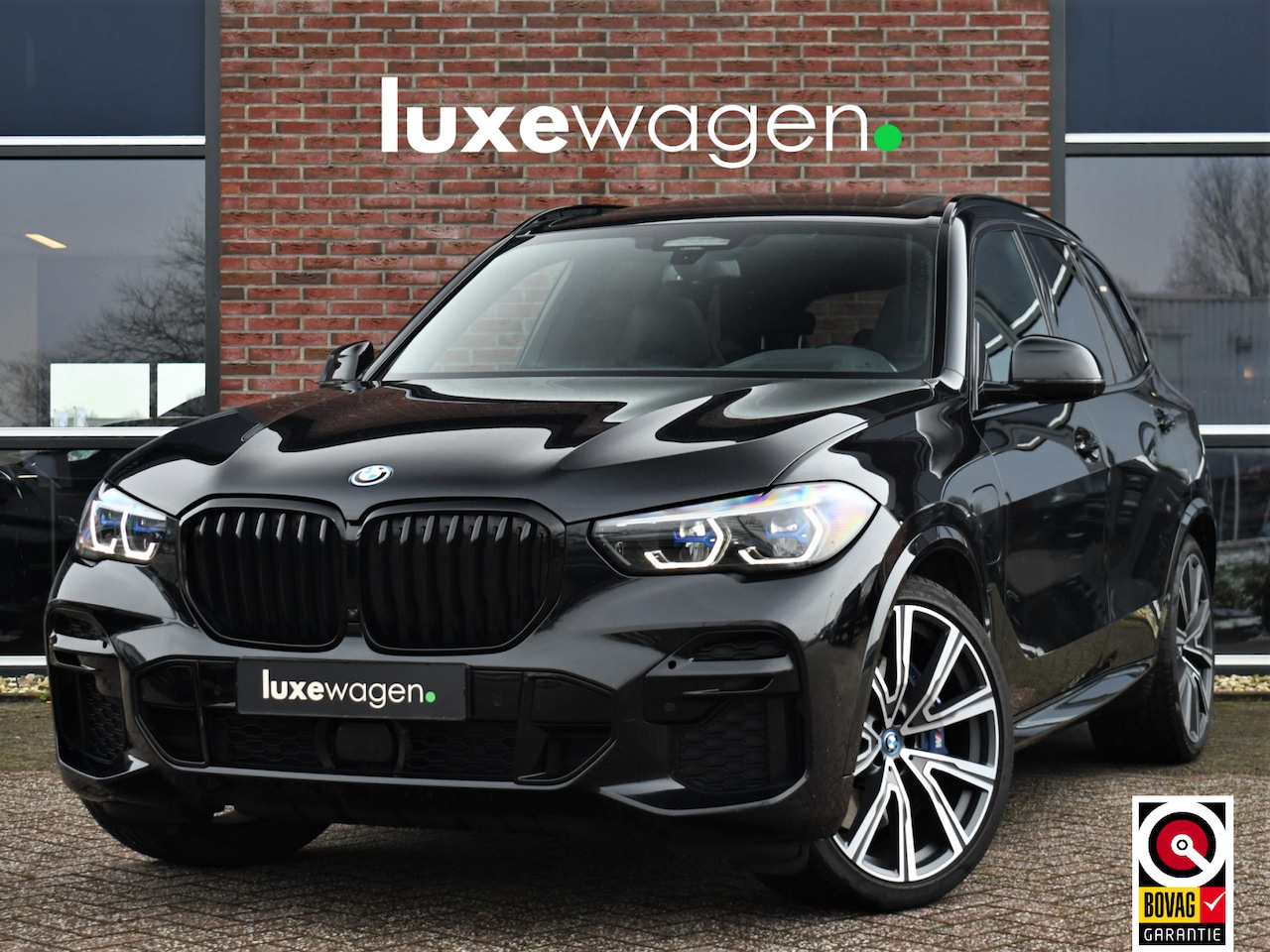 BMW X5 - xDrive45e M-Sport Pano M-zetels ACC 360 HUD 22inch - AutoWereld.nl