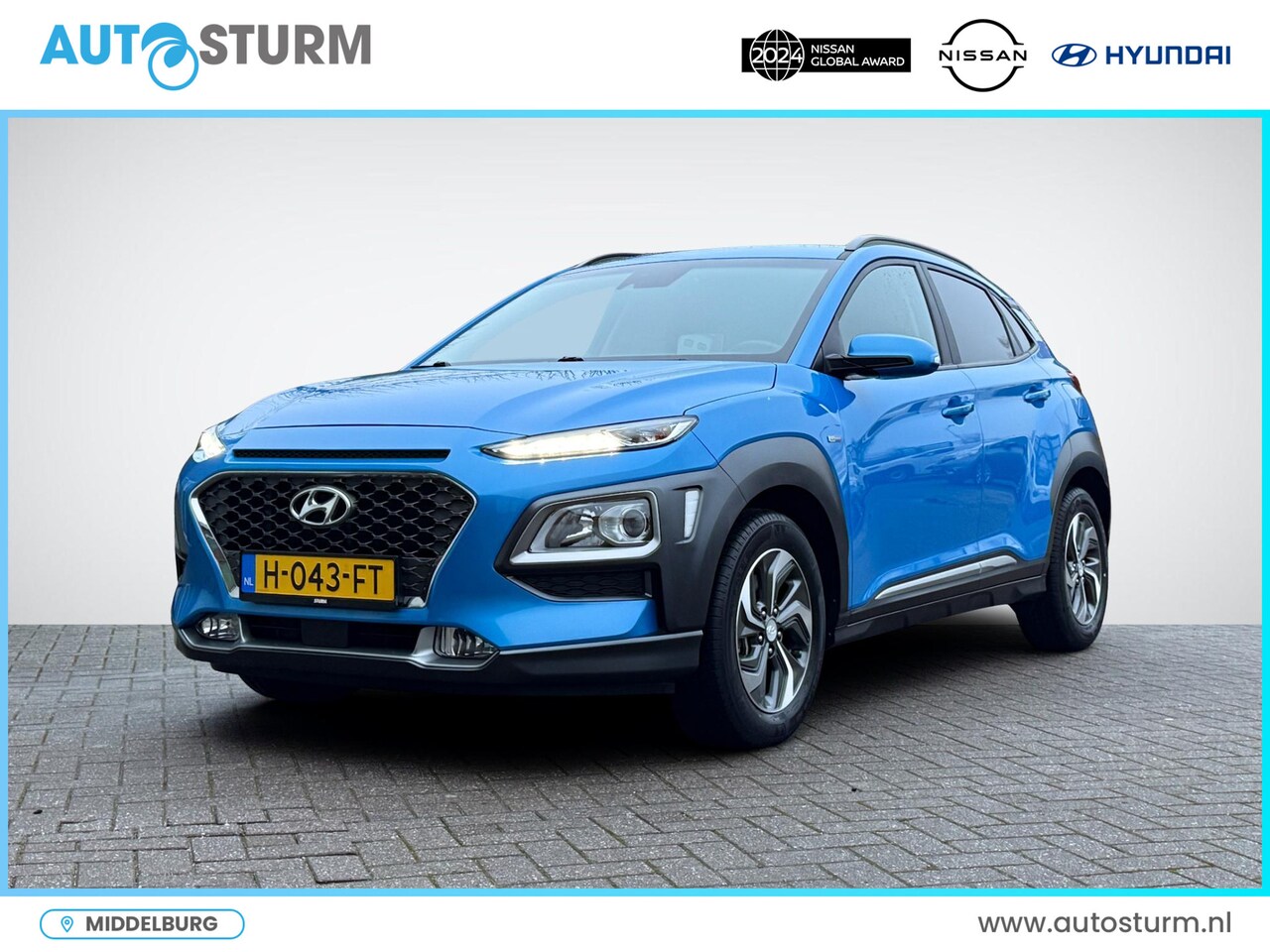 Hyundai Kona - 1.6 GDI HEV Fashion | Navigatie | Camera | Adapt. Cruise Control | Head-Up Display | Keyle - AutoWereld.nl