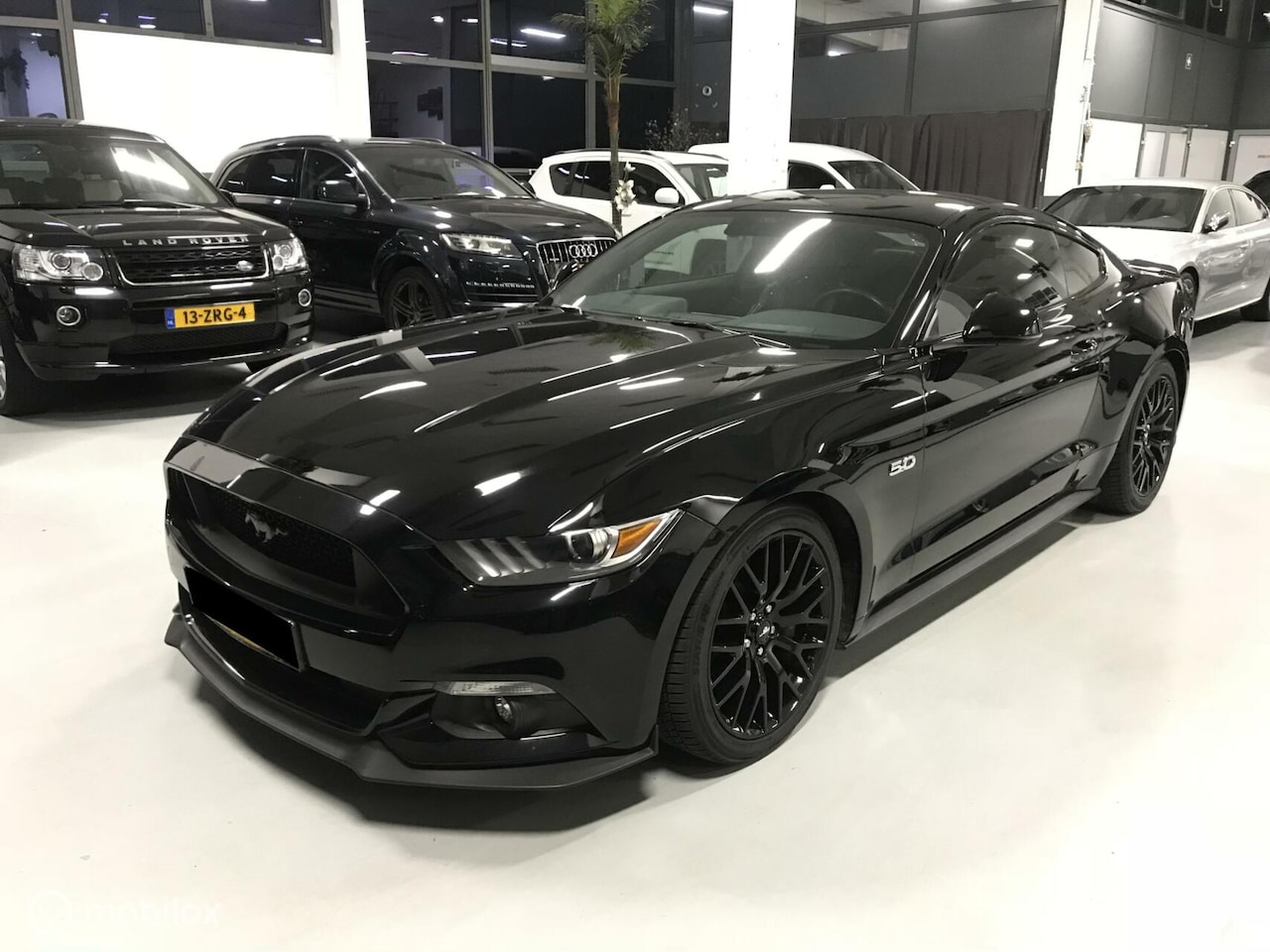 Ford Mustang Fastback - 5.0 V8 GT Zwart Automaat - AutoWereld.nl