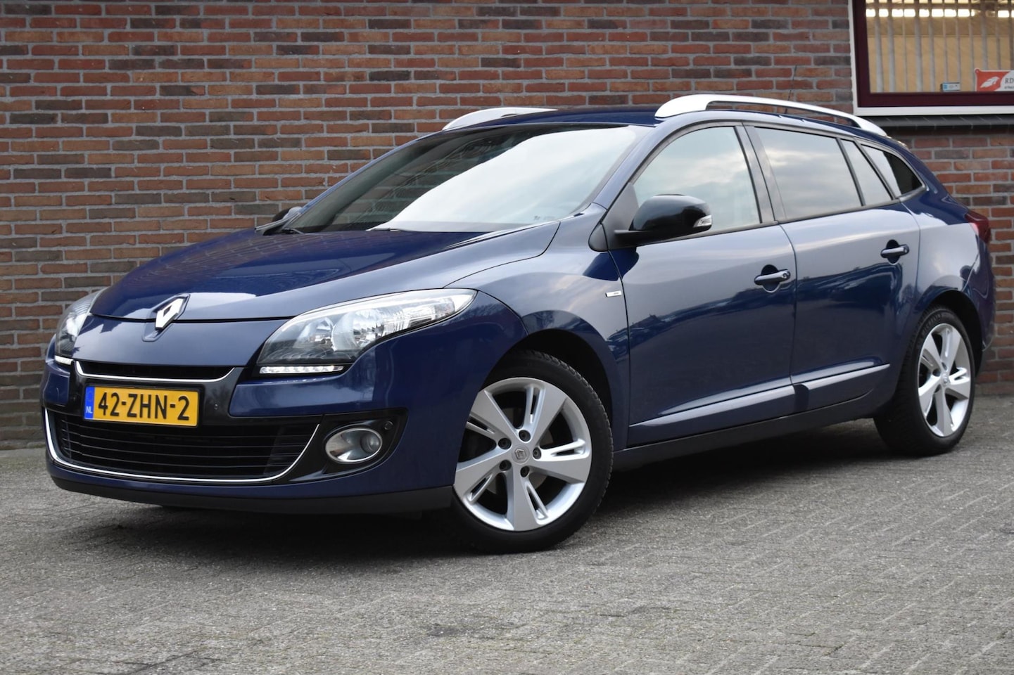 Renault Mégane Estate - 1.5 dCi Bose '12 Navi Clima Cruise - AutoWereld.nl