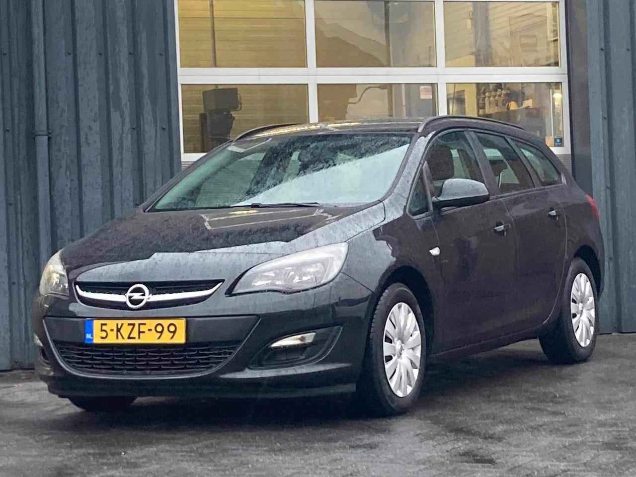 Opel Astra Sports Tourer - 1.4 Airco Cruise controle Trekhaak - AutoWereld.nl