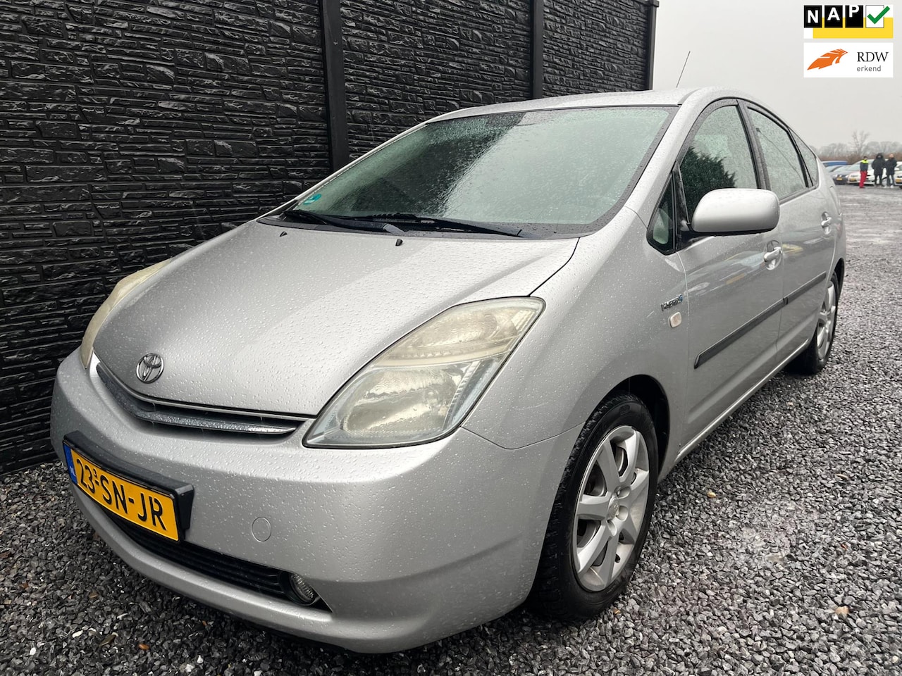 Toyota Prius - 1.5 VVT-i Business Edition 1.5 VVT-i Business Edition,Orgineel NL Auto, Ledere Bekleding, Navi, Camera, Airco, - AutoWereld.nl