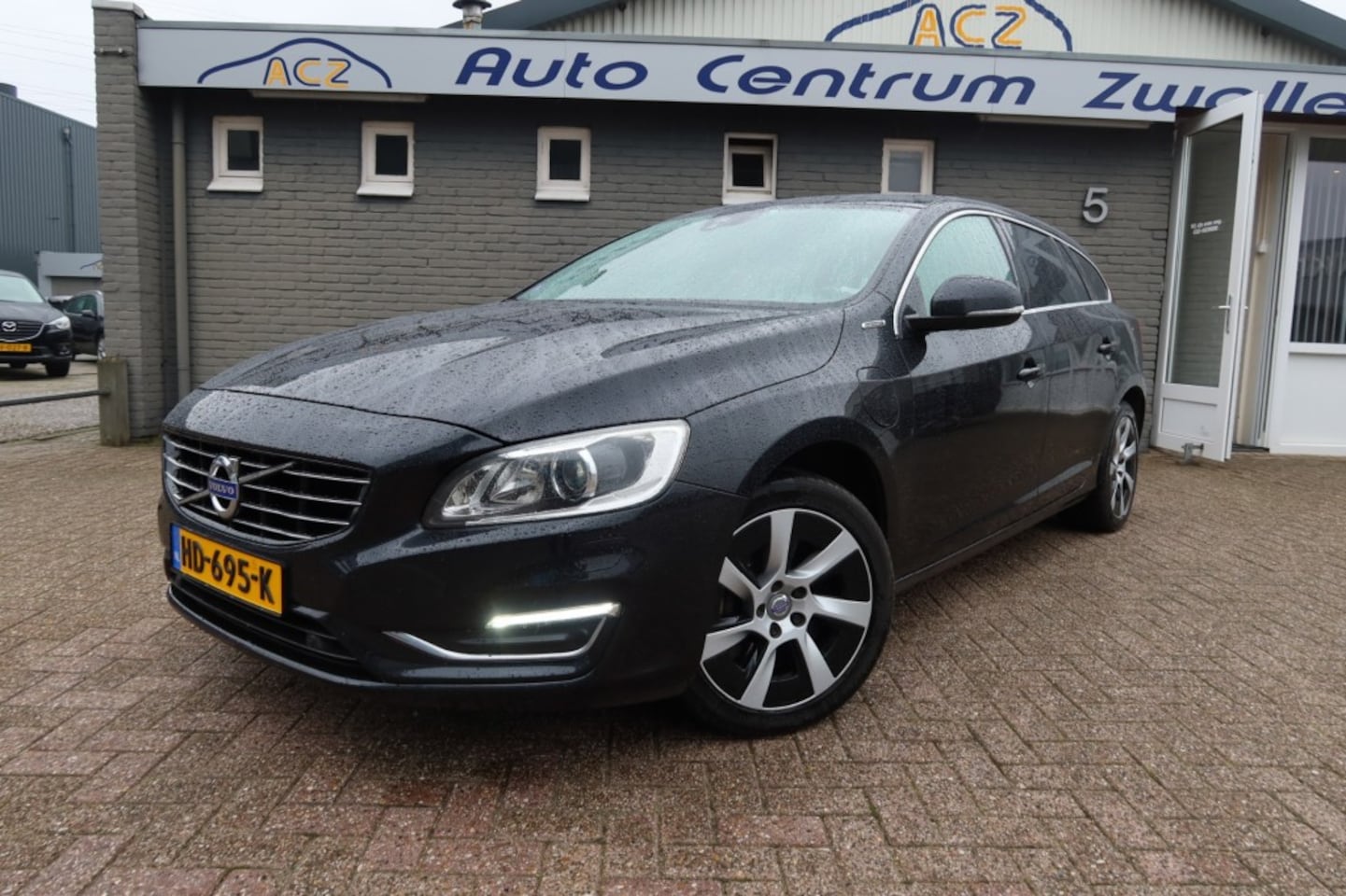 Volvo V60 - 2.4 D6 AWD HYBRIDE  SUMMUM. - AutoWereld.nl