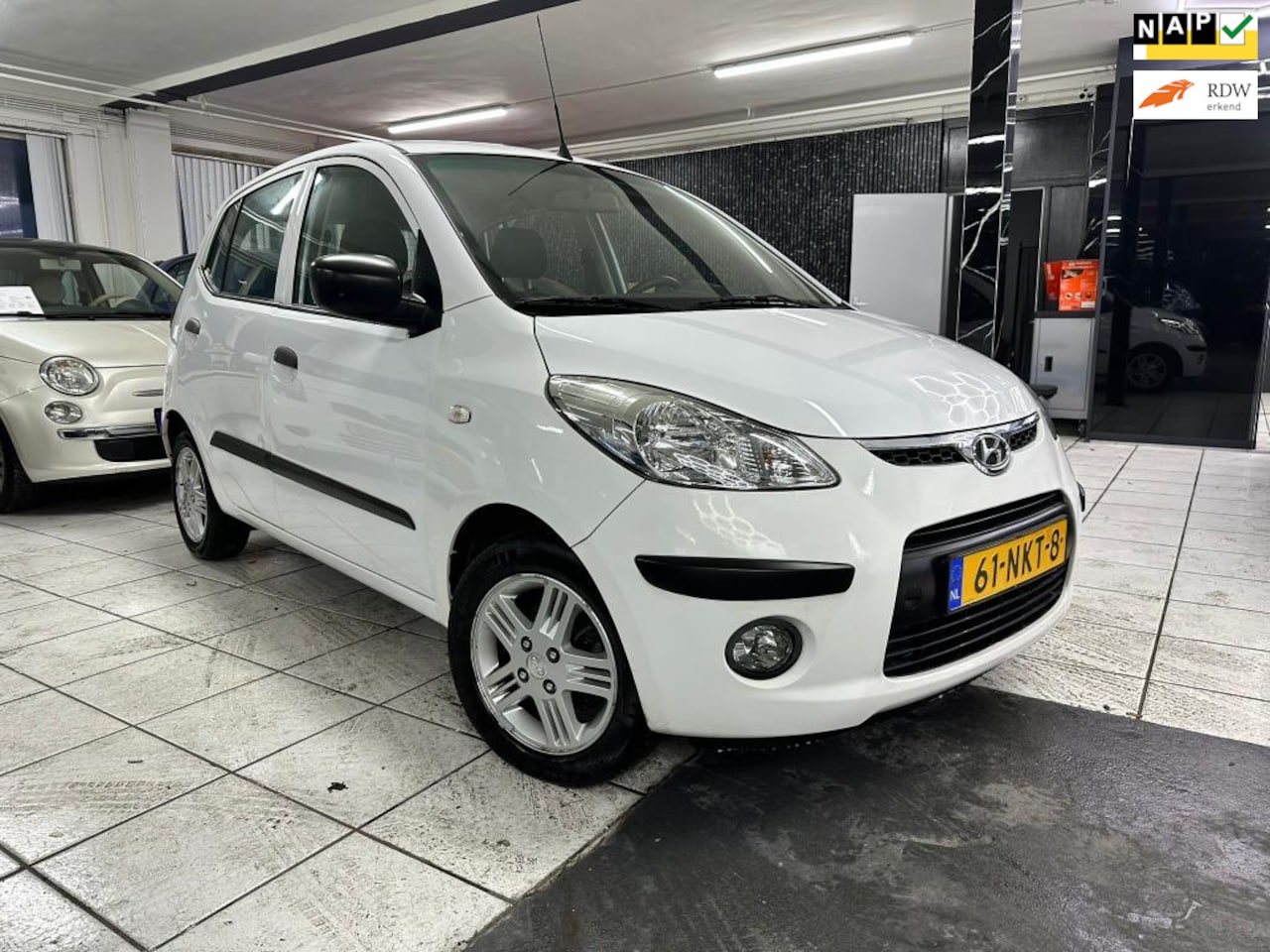 Hyundai i10 - 1.1 Active Orange Babies 1.1 Active Orange Babies - AutoWereld.nl