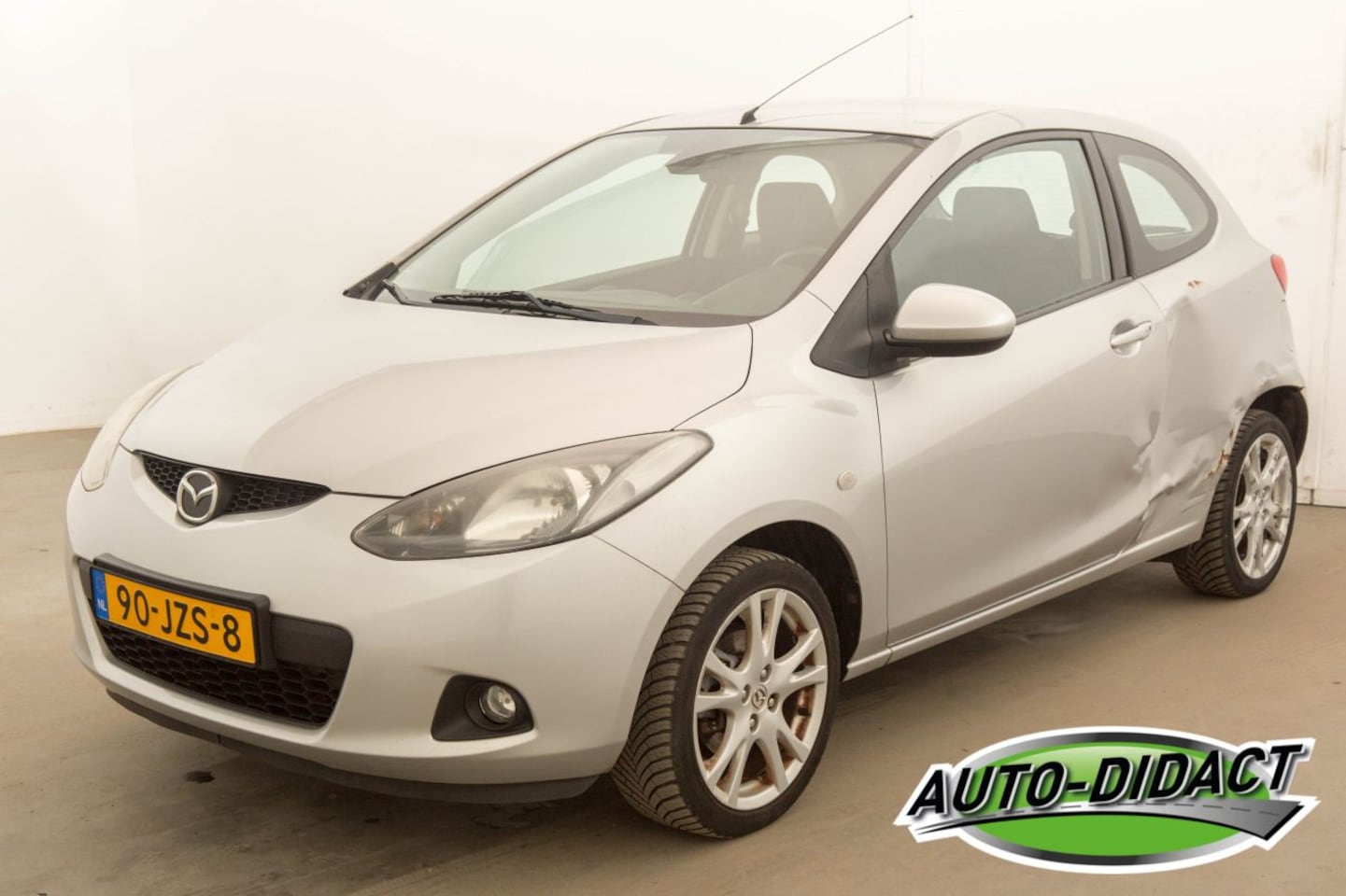 Mazda 2 - 1.3 Airco 123.540 km TS Plus - AutoWereld.nl