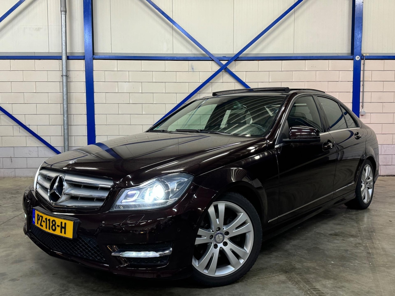 Mercedes-Benz C-klasse - 180 AMG PANO|NAVI|GORDIJN|STOELVERW - AutoWereld.nl