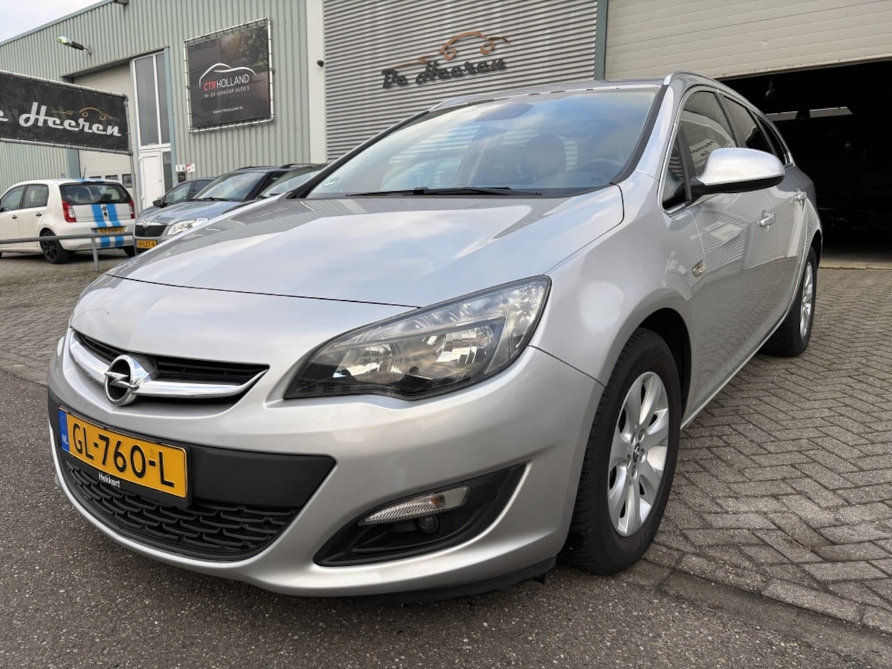 Opel Astra Sports Tourer - 1.4 Turbo Blitz Navi - AutoWereld.nl