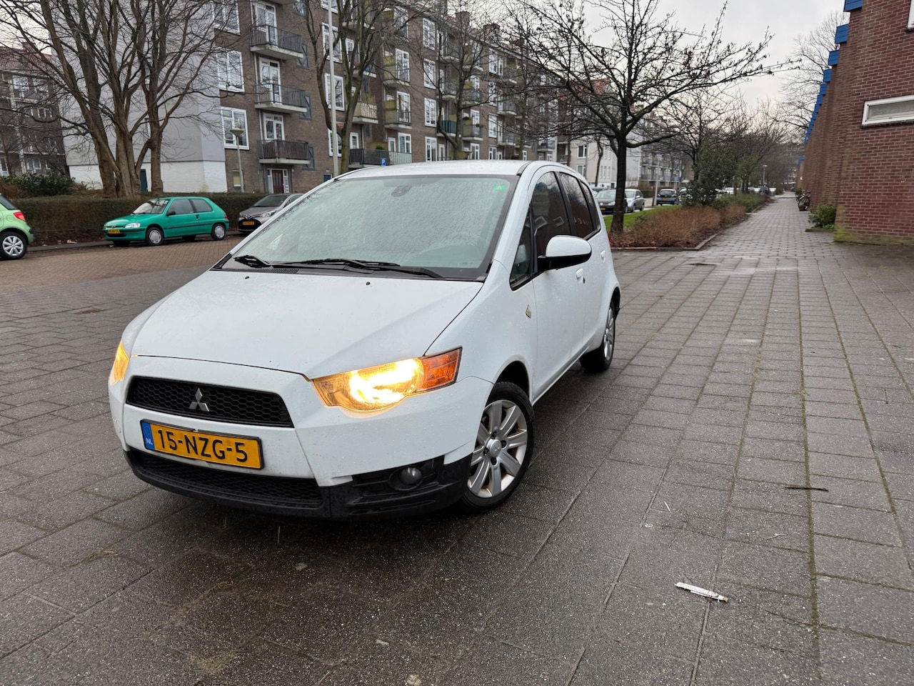 Mitsubishi Colt - 1.3 Automaat Edition Two Airco Cruise Snow White - AutoWereld.nl