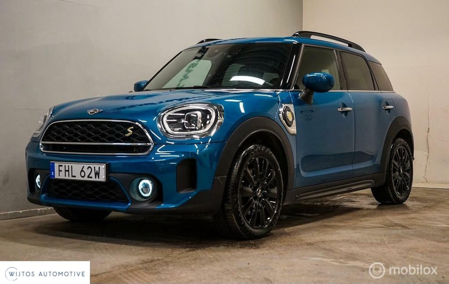 MINI Countryman - 2.0 Cooper S E ALL4 2.0 Cooper S E ALL4, sportstoelen, navi - AutoWereld.nl