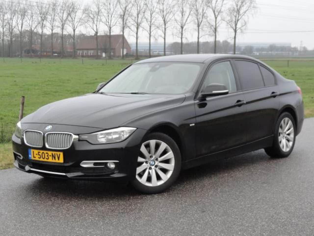 BMW 3-serie - 316i High Executive Met ECC - LEER - PDC - NAVIG - AutoWereld.nl