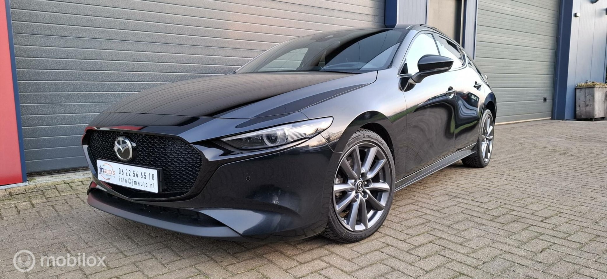 Mazda 3 - 2.0 e-SkyActiv, Leer,Cruise,Bose,Vol! - AutoWereld.nl