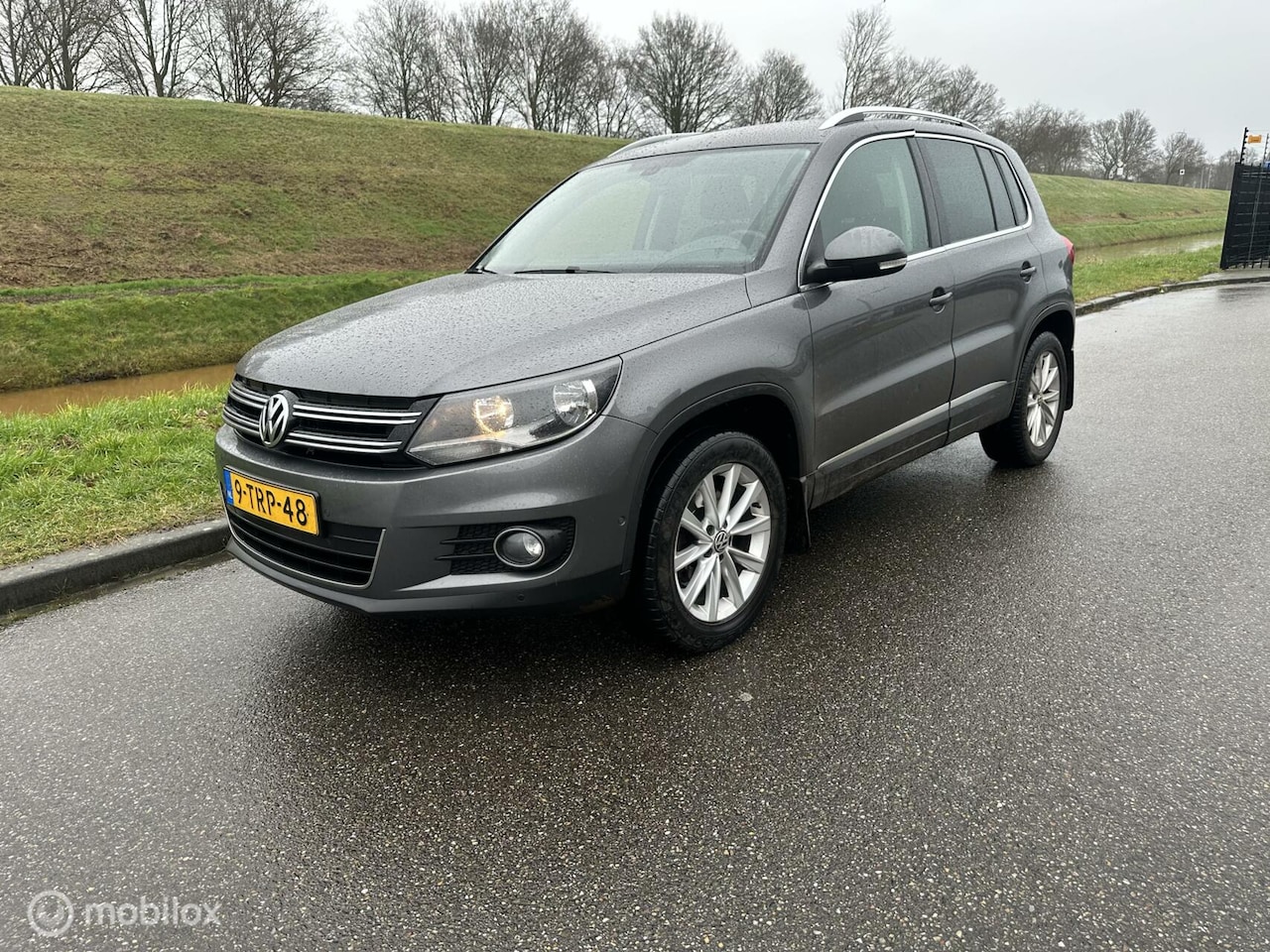 Volkswagen Tiguan - 2.0 TDI Sport&Style 4Motion ex bpm - AutoWereld.nl