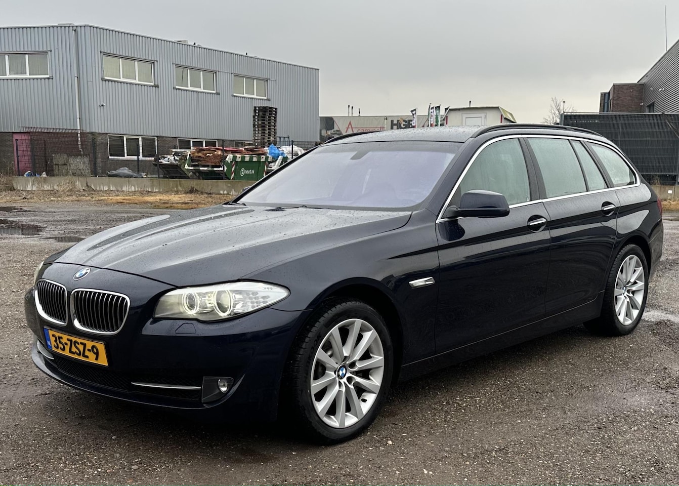 BMW 5-serie Touring - 528xi Upgrade Edition *TIKINMOTOR*/LEDER/AUTO/CRUISE - AutoWereld.nl