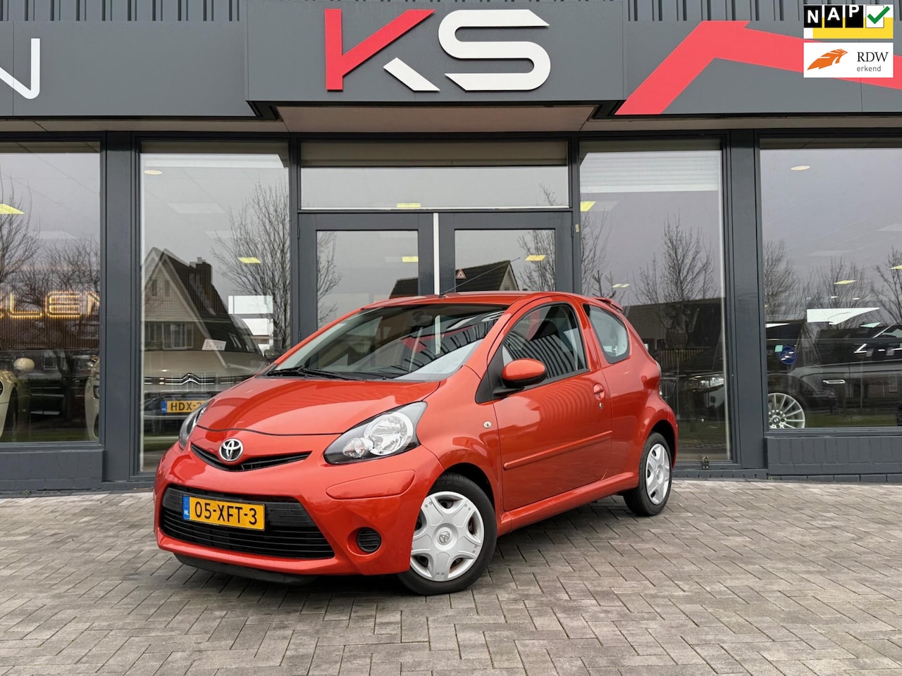 Toyota Aygo - 1.0 VVT-i Comfort Orange Airco 1e eig Nap - AutoWereld.nl