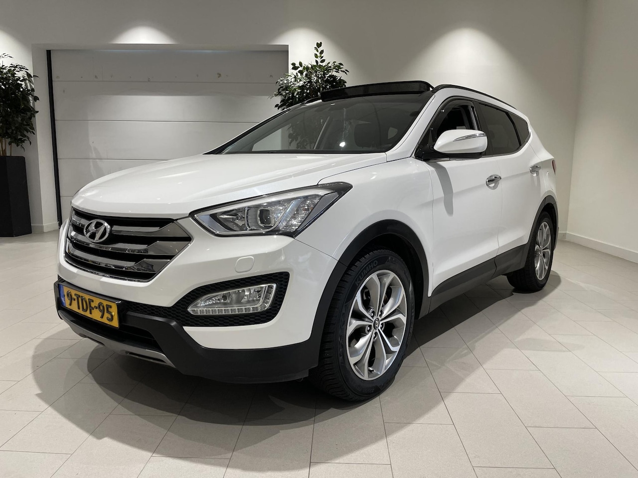 Hyundai Santa Fe - 2.4i GDI 4WD i-Catcher 7p. 192 PK | 7-Persoons | Panoramadak | Lederen Bekleding | Trekhaa - AutoWereld.nl