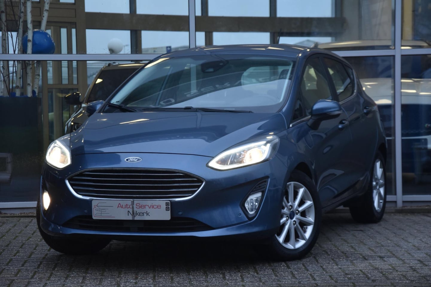 Ford Fiesta - 1.0 EcoBoost Titanium Airco Nav. Stoelverwarming 1ste Eigenaar - AutoWereld.nl