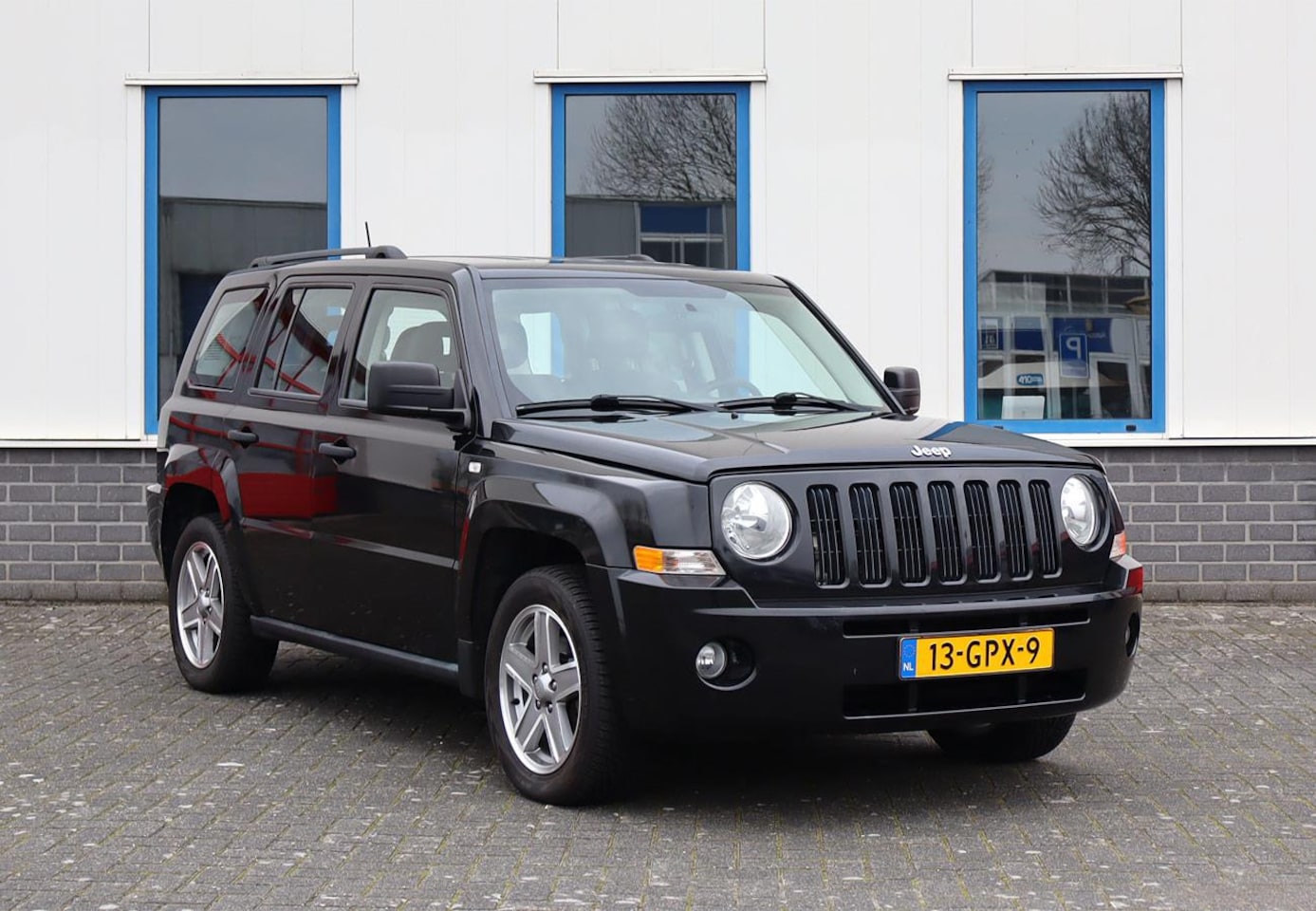 Jeep Patriot - 2.4 Adventure 4WD AC CC Zeer mooie Youngtimer - AutoWereld.nl