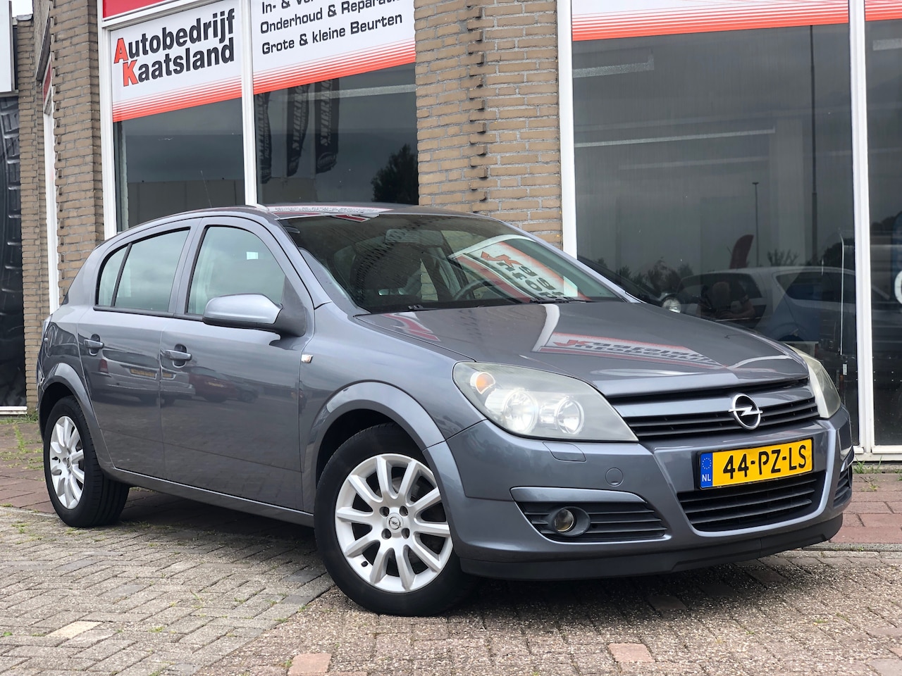 Opel Astra - 1.6 Enjoy - Cruise - Airco - AutoWereld.nl