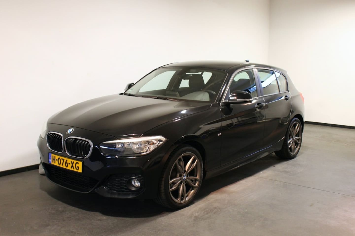 BMW 1-serie - 118I M-pakket - AutoWereld.nl