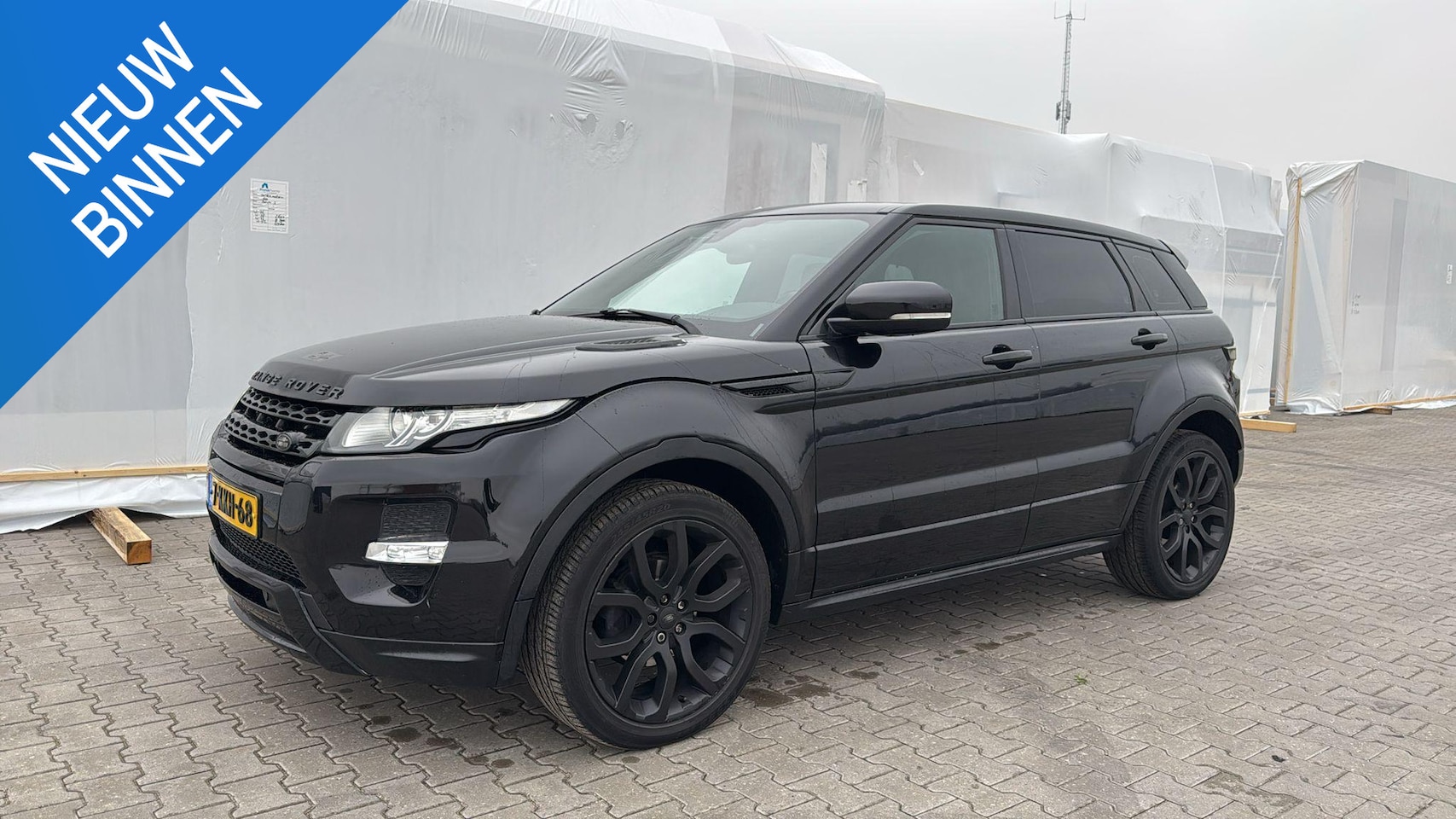 Land Rover Range Rover Evoque - 2.0 Si 4WD Prestige Pano Blackout - AutoWereld.nl