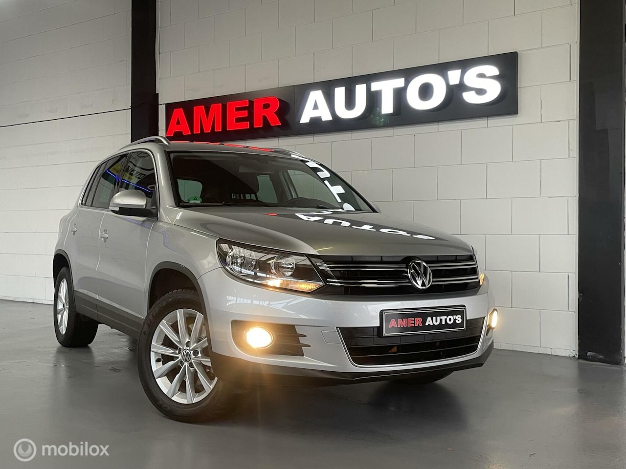 Volkswagen Tiguan - 1.4 TSI UNIEKE Lage KM 60.025/2e eign/100% - AutoWereld.nl