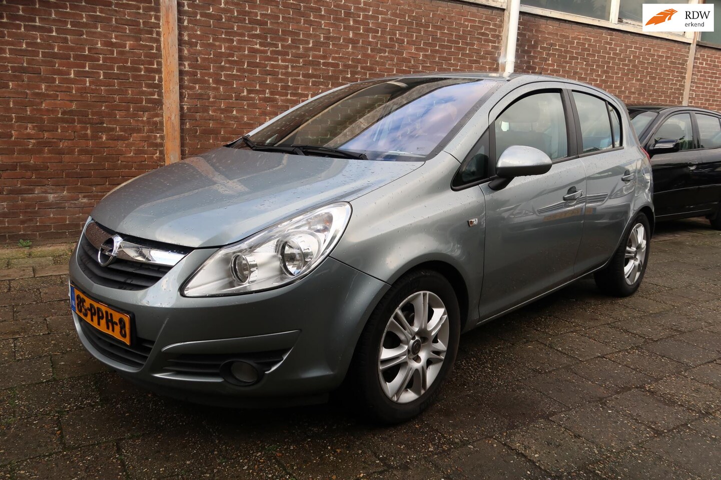 Opel Corsa - 1.4-16V Cosmo 1.4-16V Cosmo, LM velgen, CLimate control, Trekhaak, stuurbediening, half lederen bekledin - AutoWereld.nl