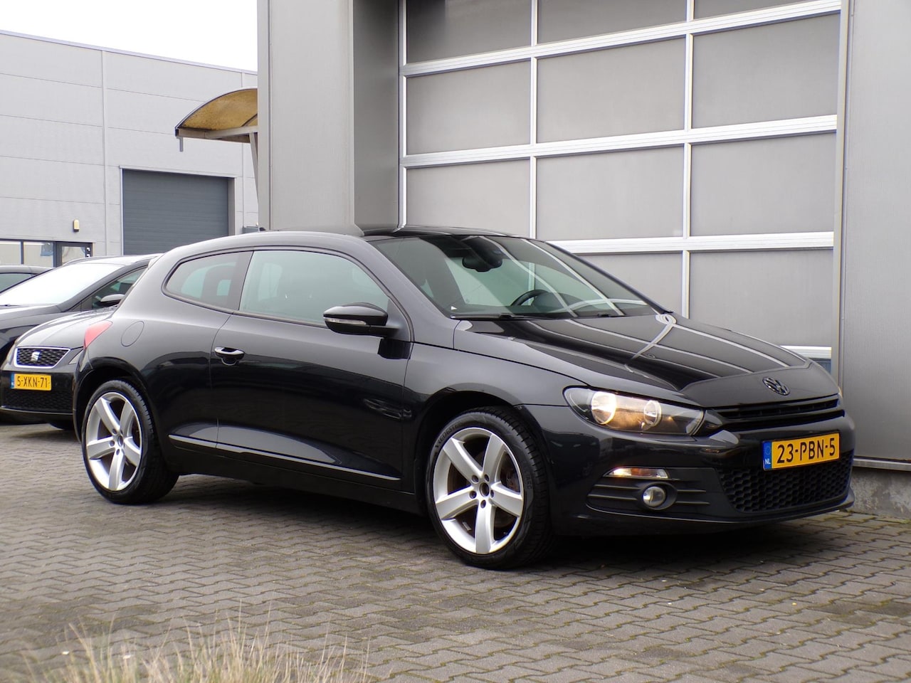 Volkswagen Scirocco - 1.4 TSI Highline Plus Pano dak/Clima/Navi/Cruise!! - AutoWereld.nl