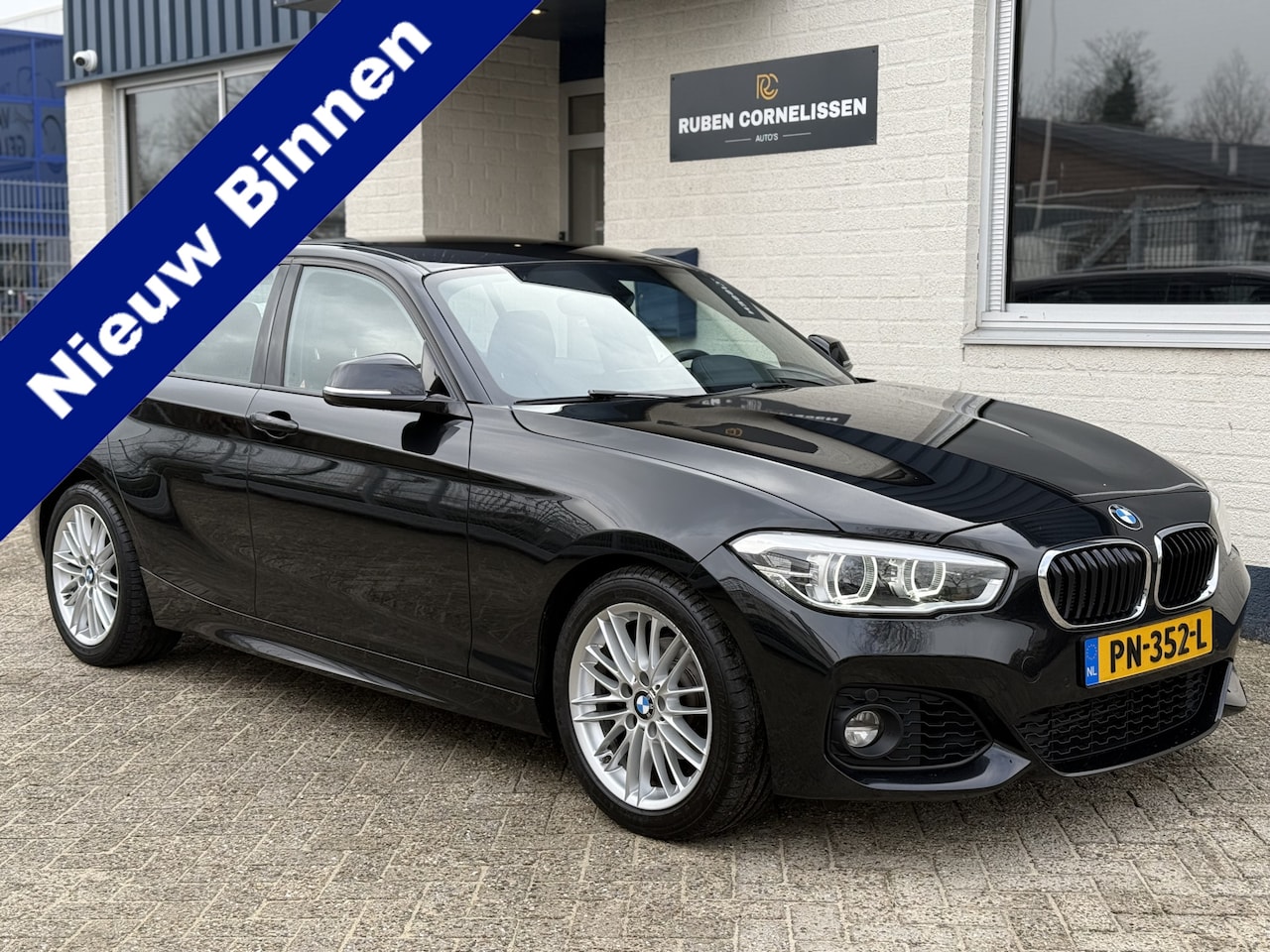 BMW 1-serie - 118i High Executive | M-Sport | Aut. | Leder | Navi | Stoelverwarming - AutoWereld.nl