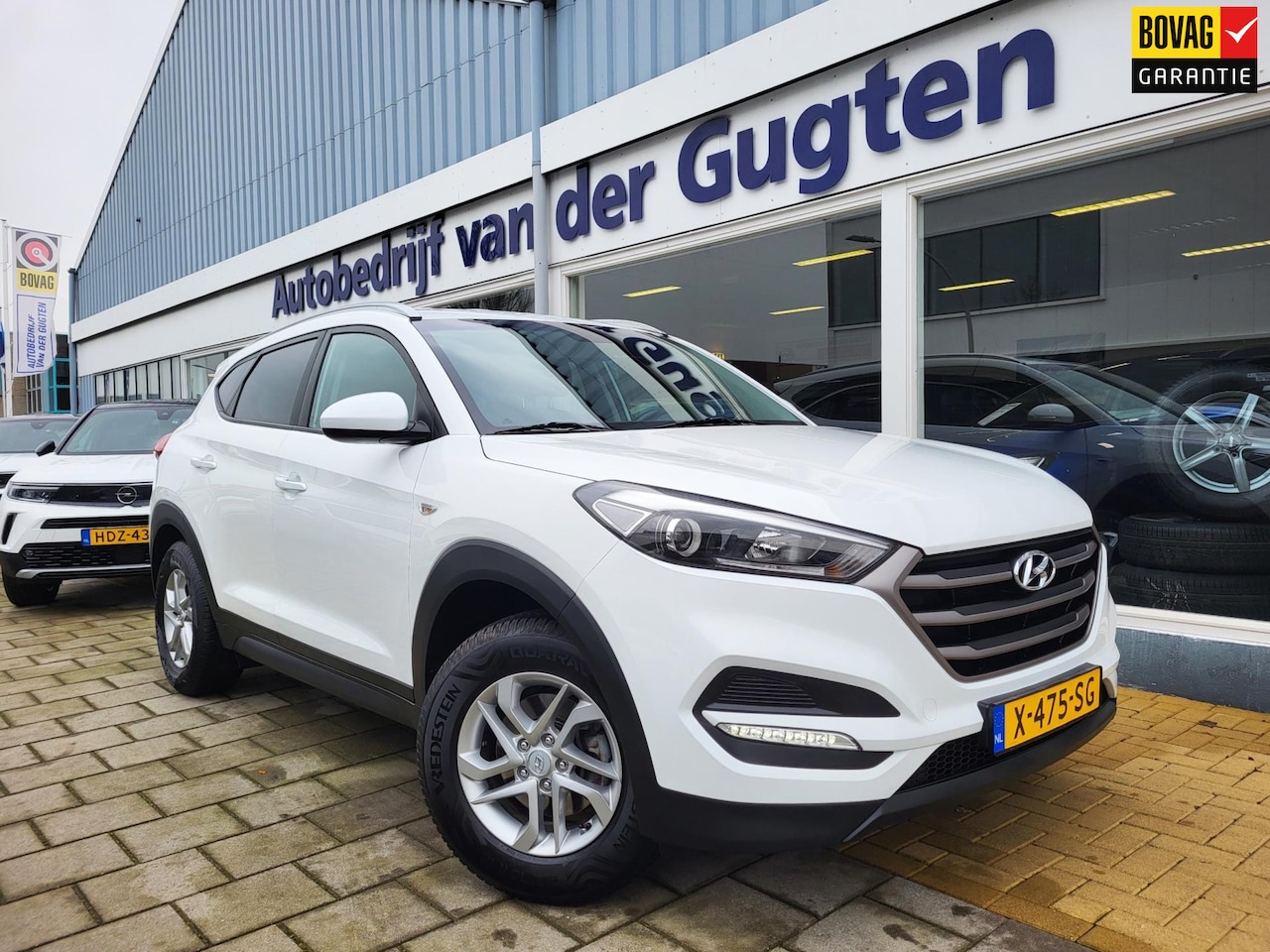 Hyundai Tucson - 1.6 GDi i-Drive / Stoelverwarming / 58.000 Km / Bluetooth / - AutoWereld.nl