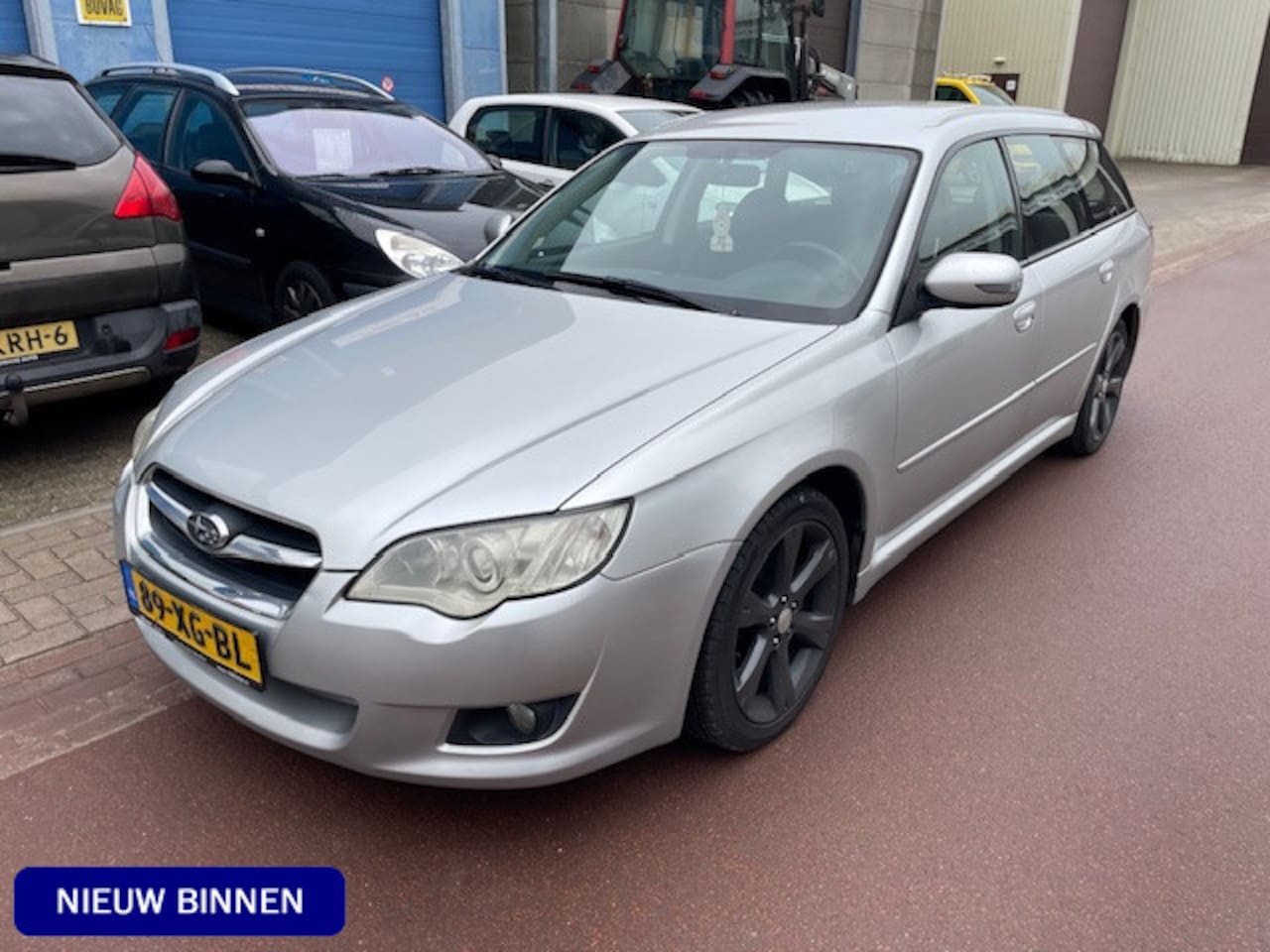 Subaru Legacy Touring Wagon - 2.0R AWD Comfort 121KW NAP + Boekjes aanwezig Airco, 17" Sportvelgen met goede banden, etc - AutoWereld.nl