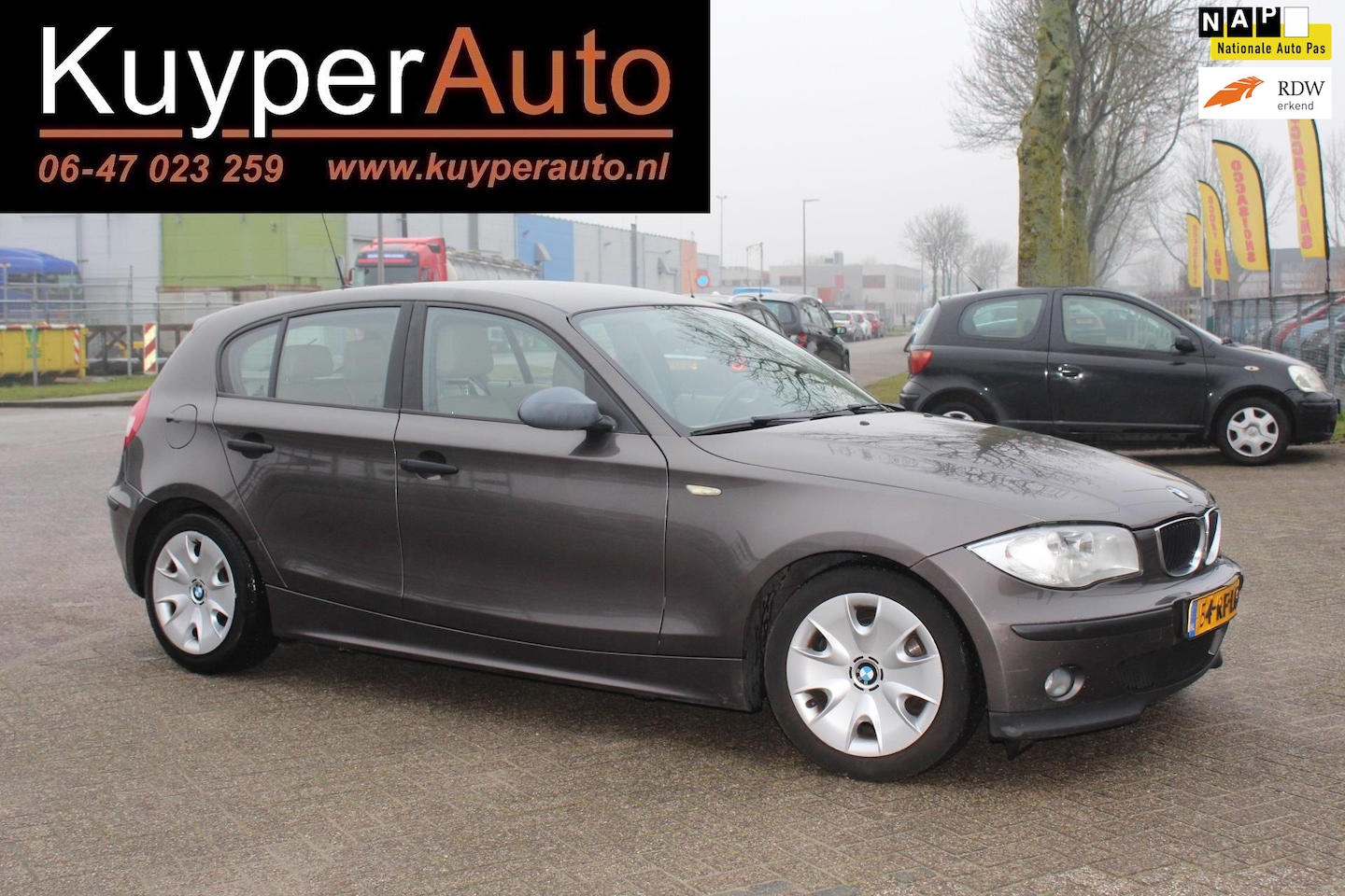 BMW 1-serie - 118i automaat vol leder airco - AutoWereld.nl