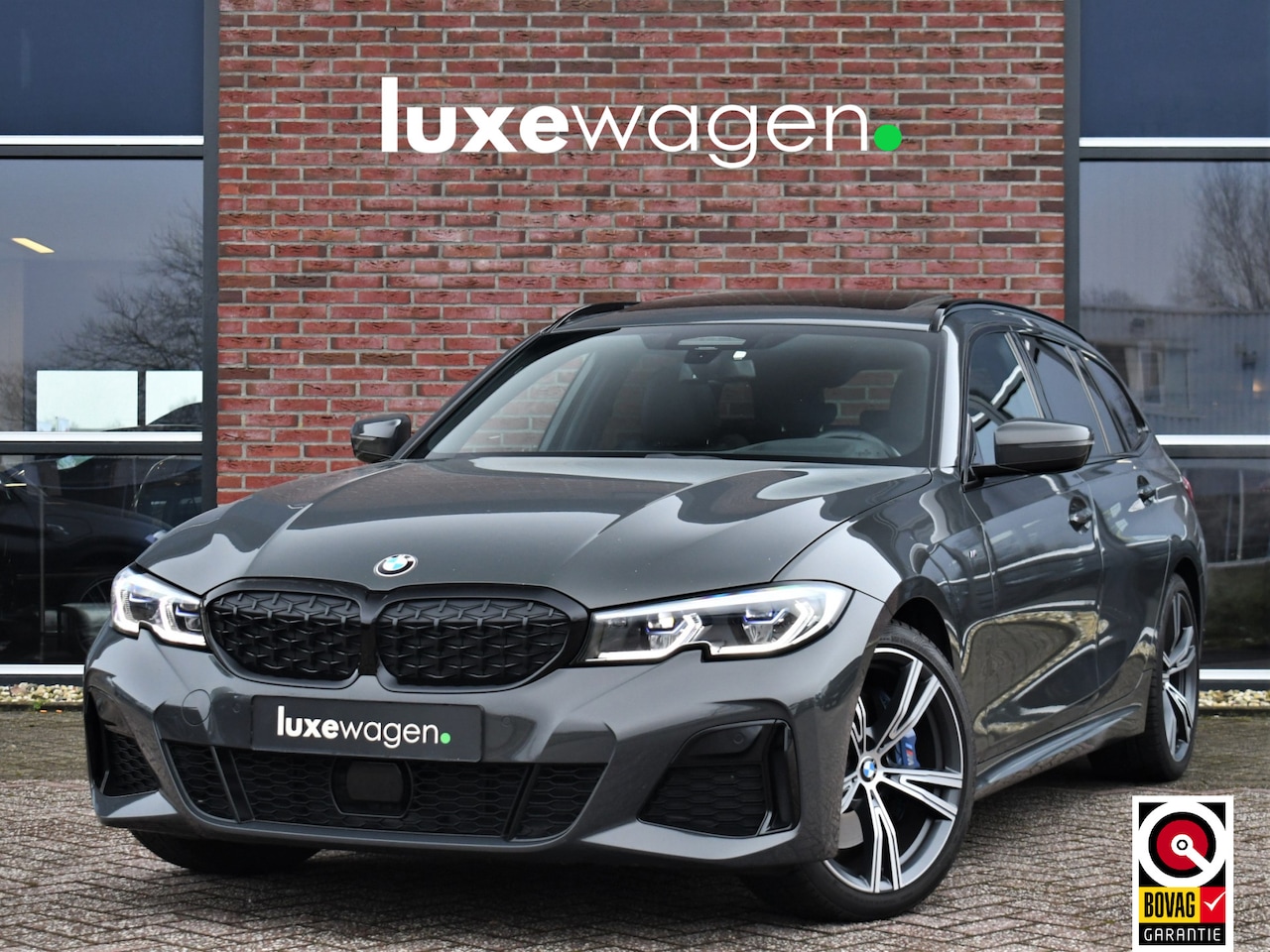 BMW 3-serie Touring - M340i xDrive Pano ACC H/K Laser Standk HUD Adp-onderstel El-zetels - AutoWereld.nl