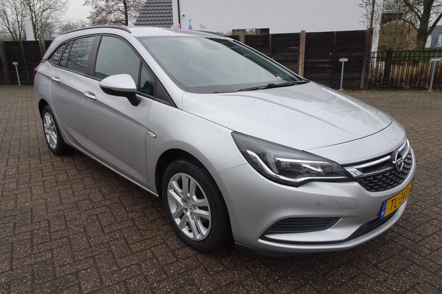 Opel Astra Sports Tourer - 1.0 Online Edition 1.0 TURBO SPORTSWAGON 105 pk * AIRCO * NAVI * PDC * - AutoWereld.nl