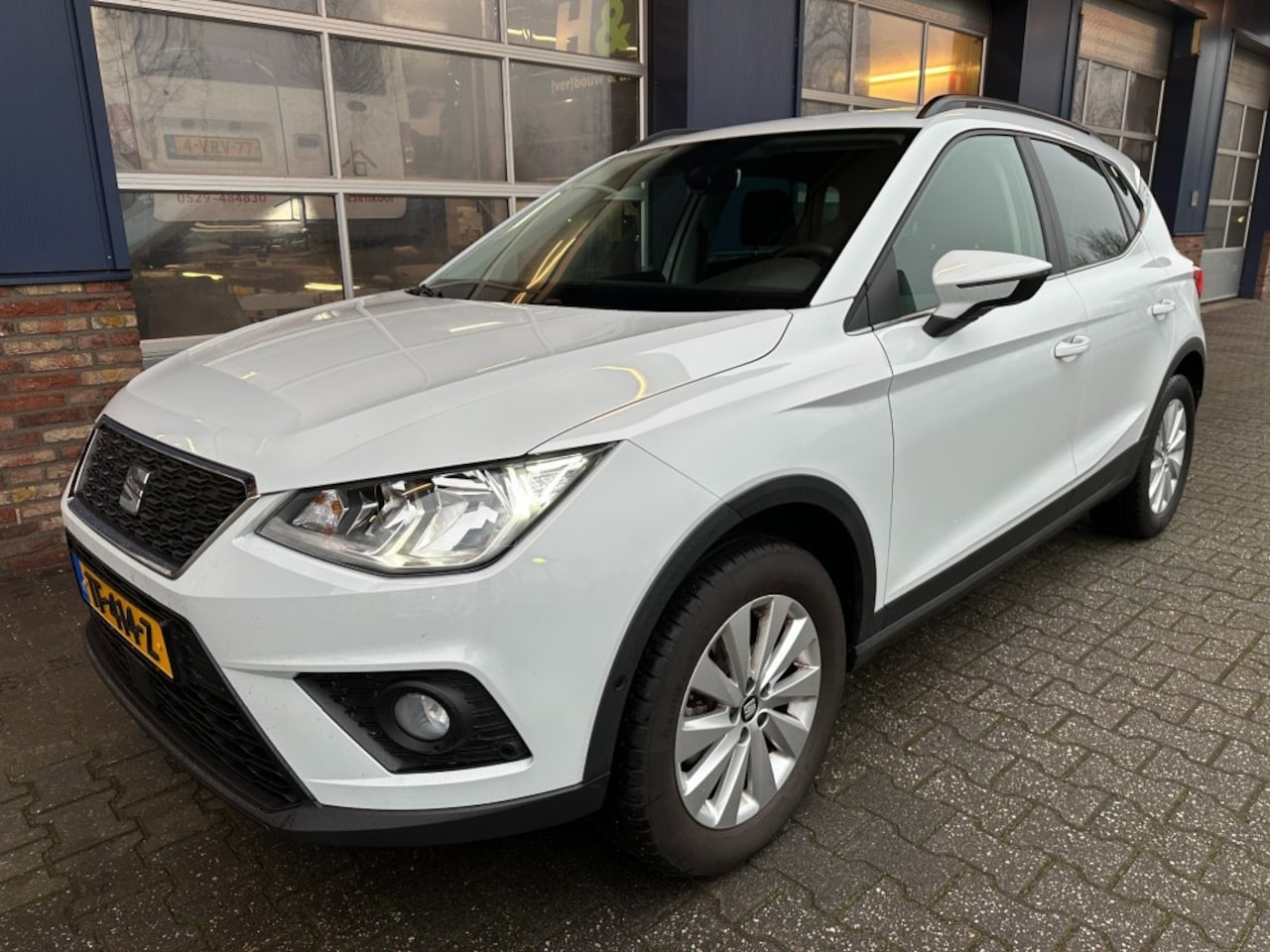 Seat Arona - 1.0 TSI STYLE B. INT TREKHAAK.  CAMERA.  ALL.IN. - AutoWereld.nl