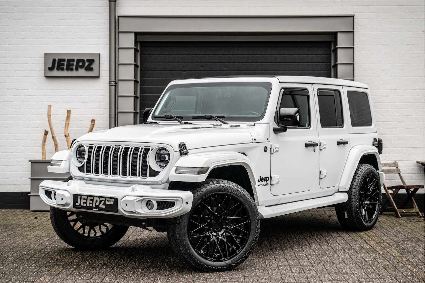 Jeep Wrangler Unlimited - 2.0T Sahara - Open Sky - 22" Lmv - Brute look - AutoWereld.nl