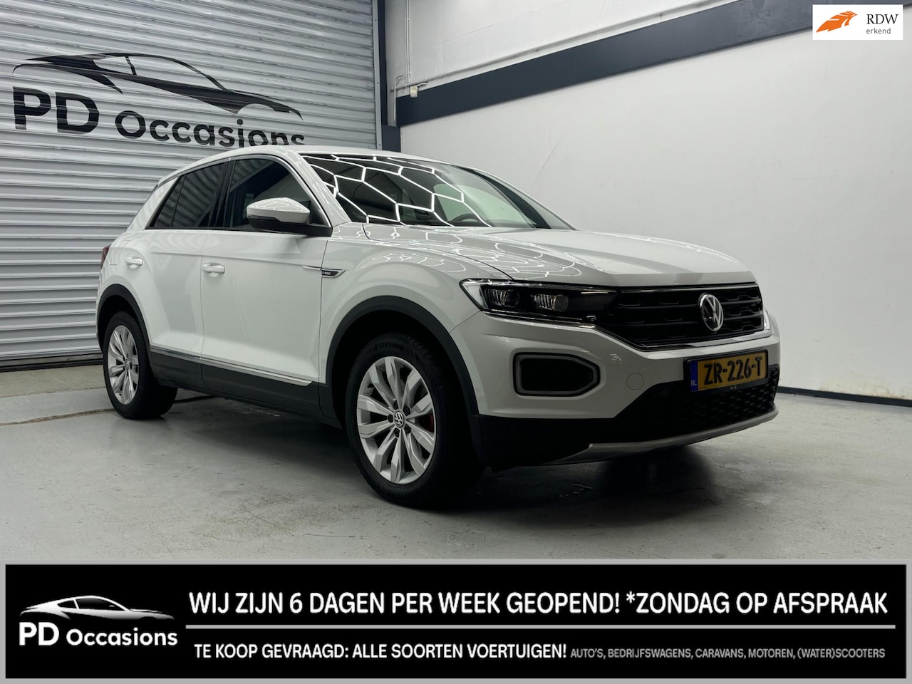 Volkswagen T-Roc - 1.5 TSI Sport - 150PK - Trekhaak - Camera - Half leer - Clima - Navi - AutoWereld.nl