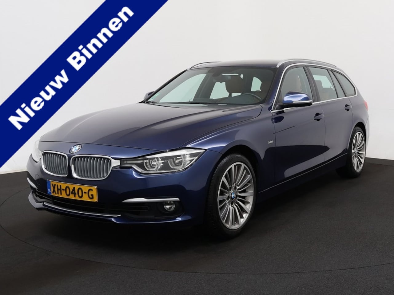 BMW 3-serie Touring - 318i Luxury Edition 318i Luxury Edition, automaat, full options, leder, navigatie, blauw metallic - AutoWereld.nl