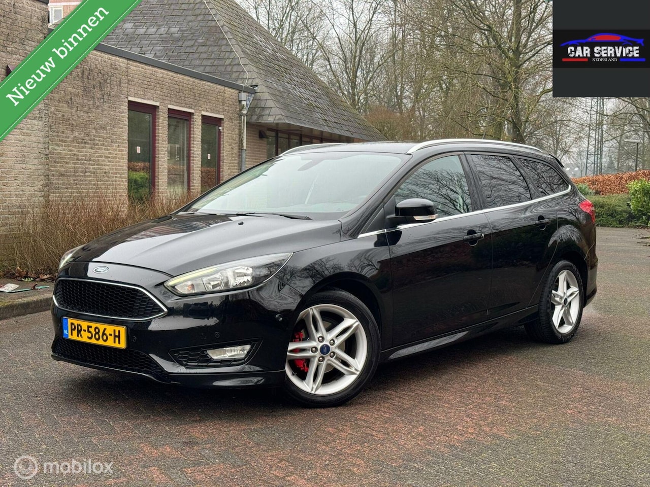 Ford Focus Wagon - 1.0 ST-Line Keyless/PDC/STLVERW/NETTE STAAT - AutoWereld.nl