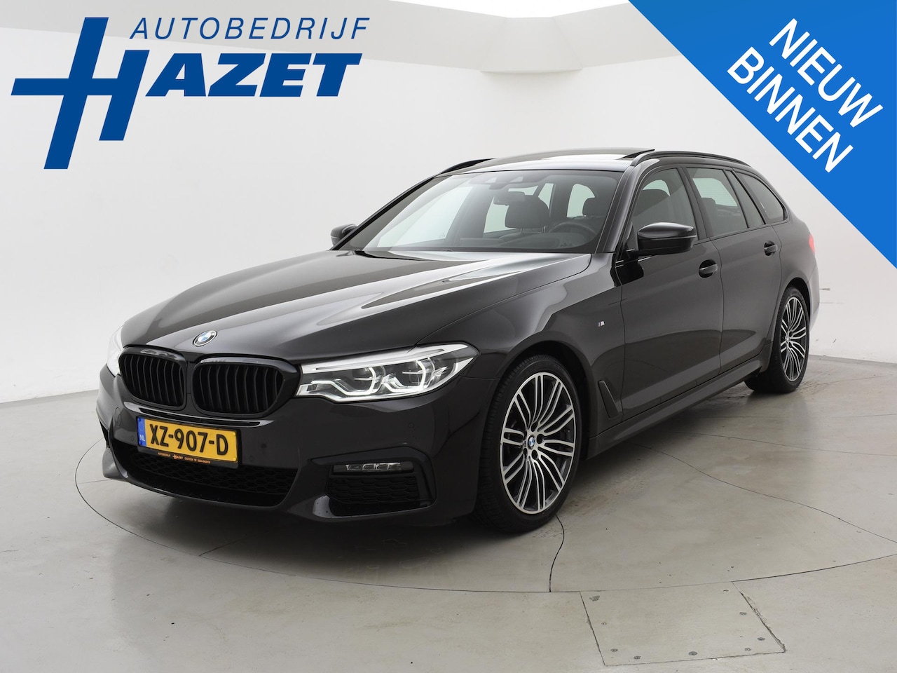 BMW 5-serie Touring - 520i 184 PK M-SPORT H.E. AUT. *ALMANDINBRAUN* + PANORAMA | NAPPA LEDER | HEAD-UP | 19 INCH - AutoWereld.nl