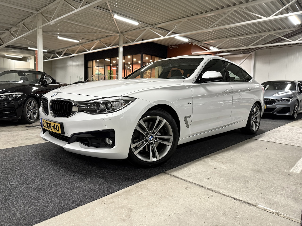 BMW 3-serie Gran Turismo - [F34] 328iA Sport Line l Pano l Keyless l Elek. trekhaak, -stoelen en achterklep - AutoWereld.nl