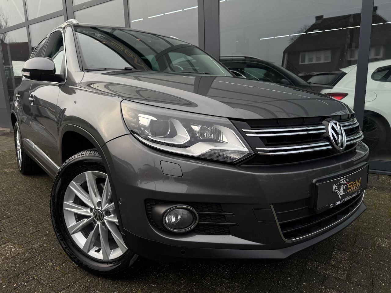 Volkswagen Tiguan - 2.0 TSI Sport&Style 4Motion - AutoWereld.nl