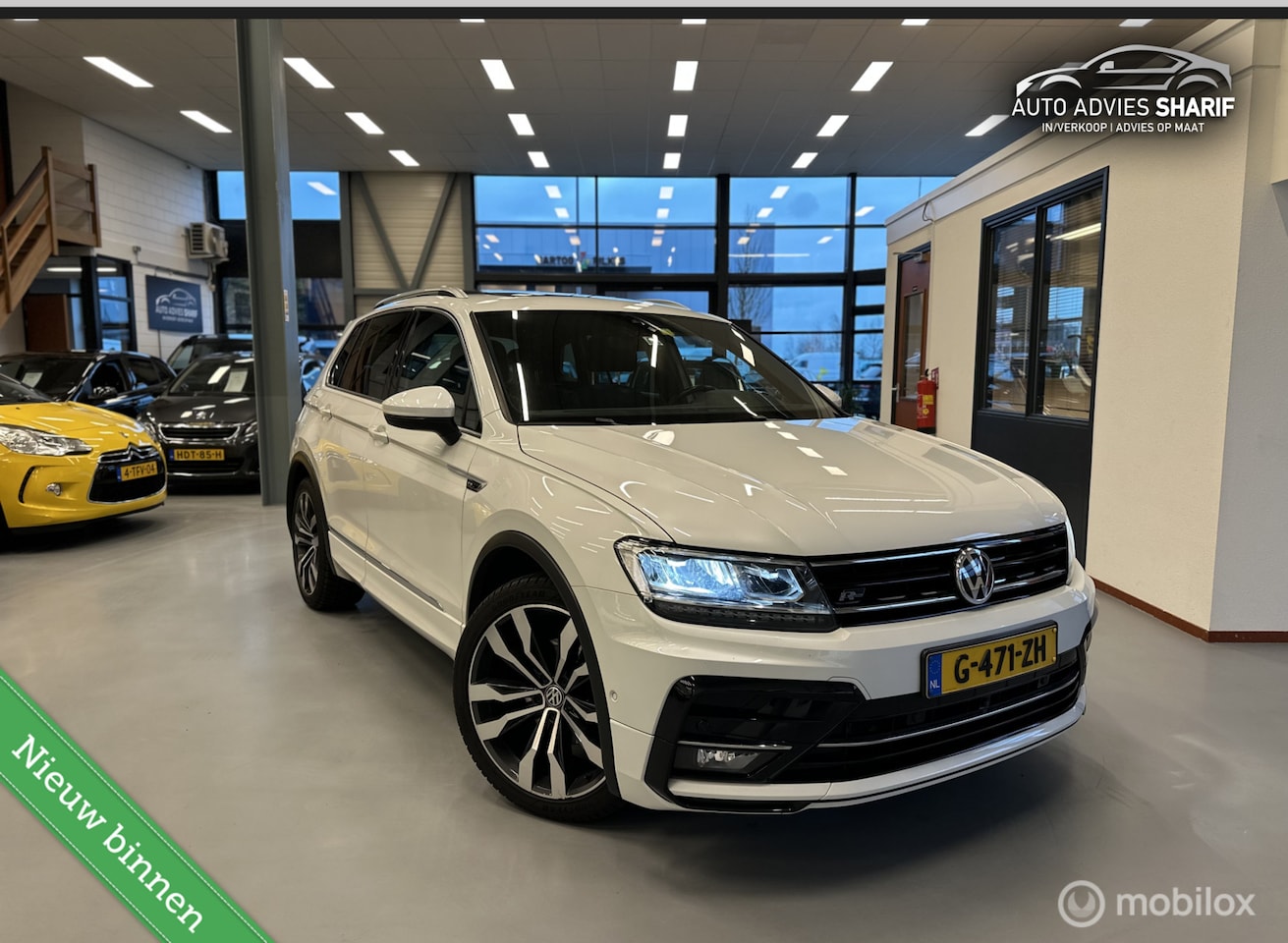 Volkswagen Tiguan - 1.5 TSI ACT R-line Cam 360 | Pano|CarPlay| - AutoWereld.nl