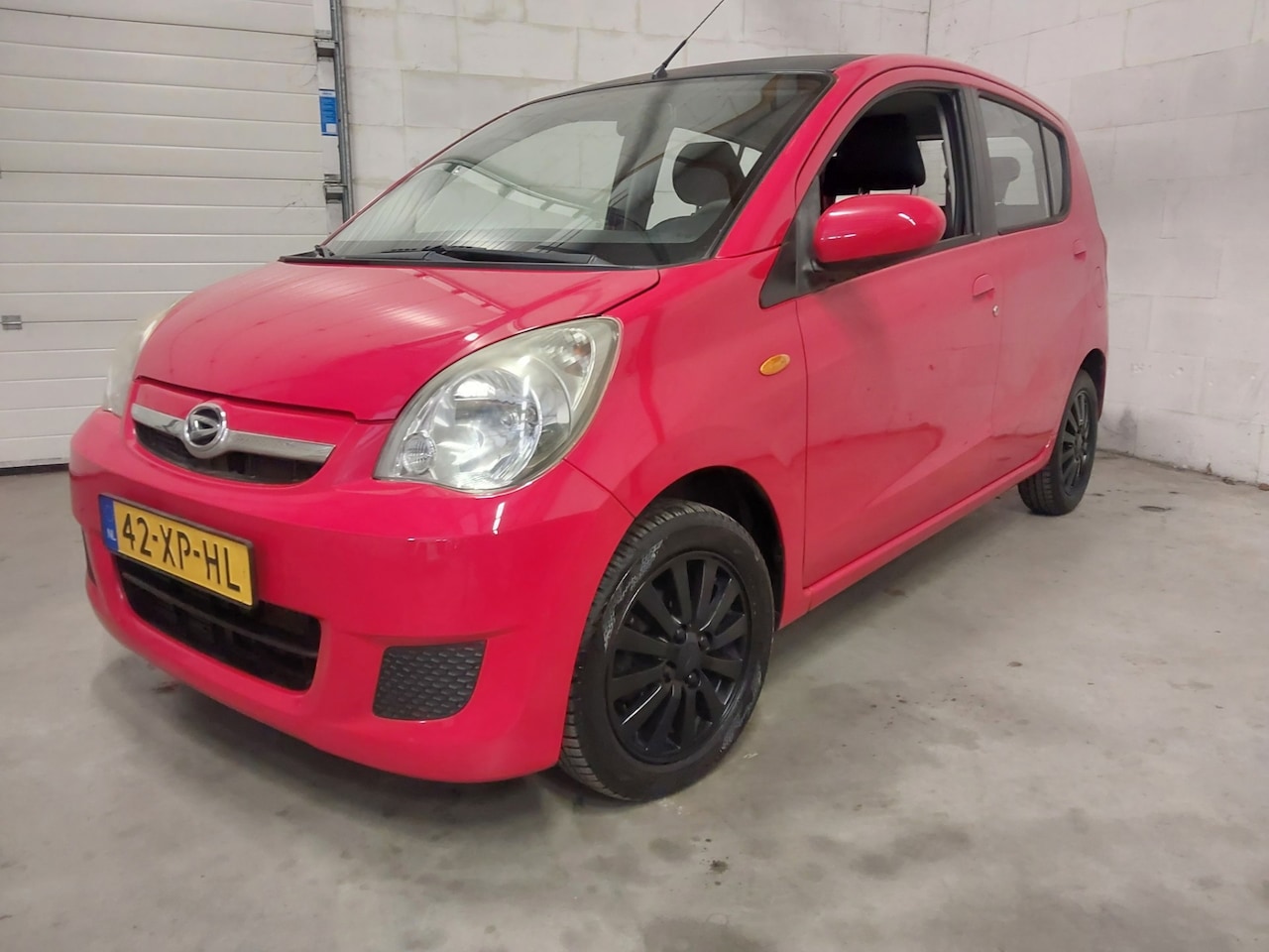 Daihatsu Cuore - 1.0 Premium 5-Deurs 119116 KM ! Airco - AutoWereld.nl