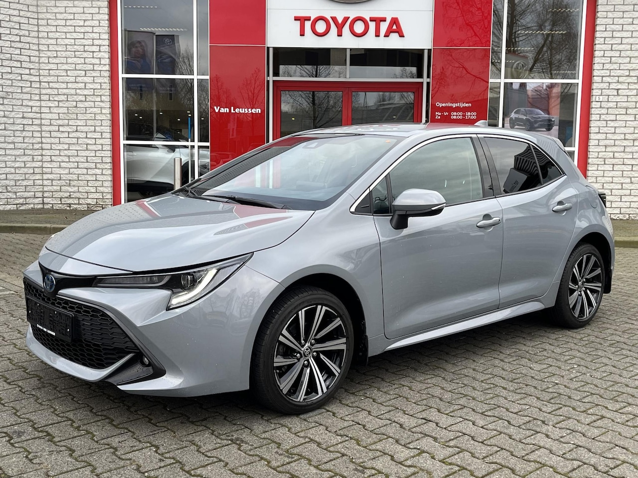 Toyota Corolla - HYBRID 140 DYNAMIC STOEL/STUURVERW. RUITENWISSERVERW. NAVI KEYLESS LM-VELGEN PARKCAMERA - AutoWereld.nl