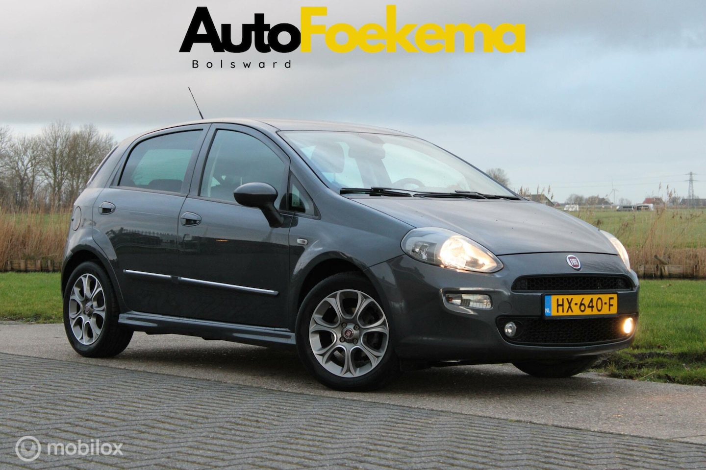 Fiat Punto - 1.3 JTD Dynamic 2 EIGENAREN CLIMA LMV PARKEERSENSOREN - AutoWereld.nl