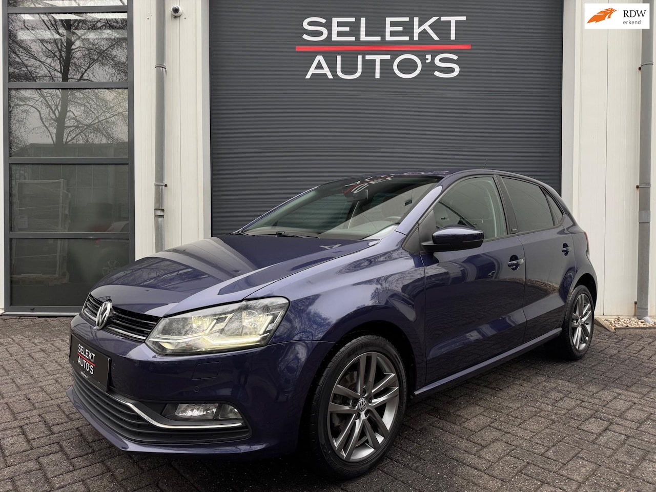 Volkswagen Polo - 1.2 TSI Allstar 90 Pk Xenon/LED/Climate/Navigatie/Bluetooth/Stoelverwarming/PDC/Start & St - AutoWereld.nl