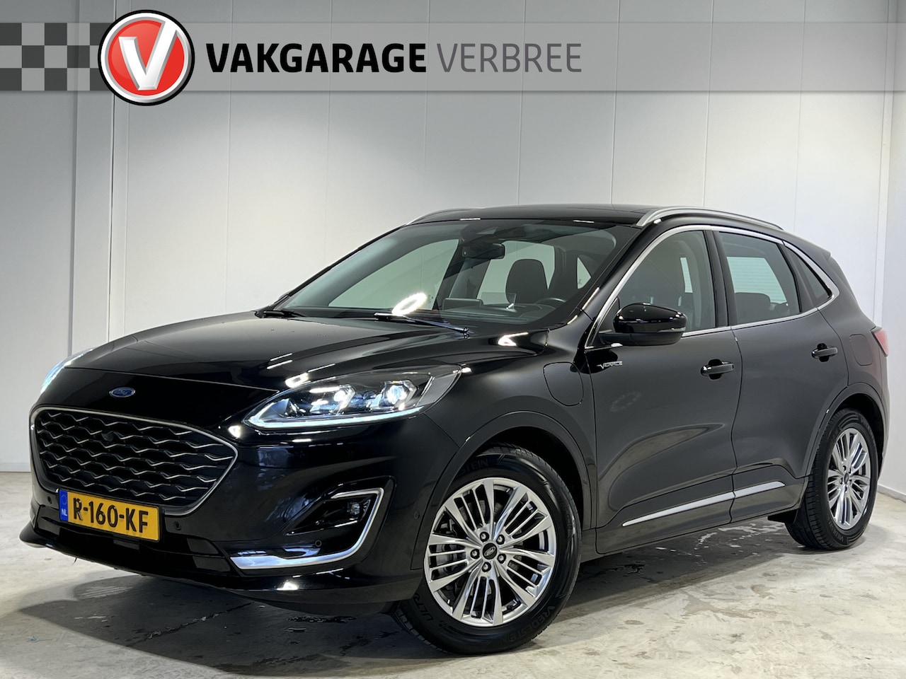 Ford Kuga - 2.5 PHEV Vignale | Navigatie | LM Velgen 18" | Winter Pakket | Elektrisch Glazen Panoramad - AutoWereld.nl