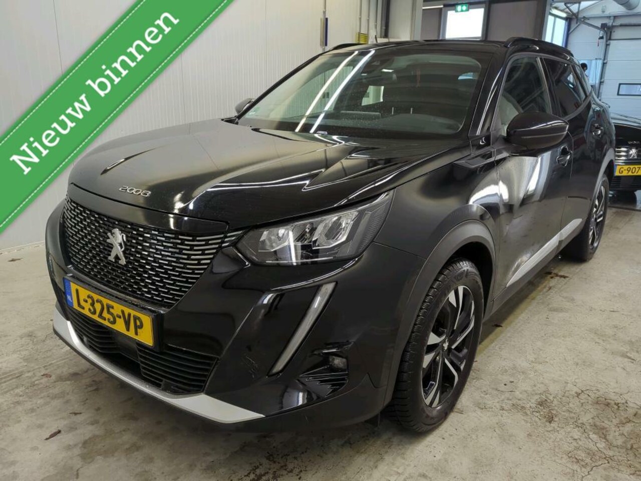 Peugeot 2008 - 1.2 Blue Lease Allure | Navi | Camera | LED | - AutoWereld.nl