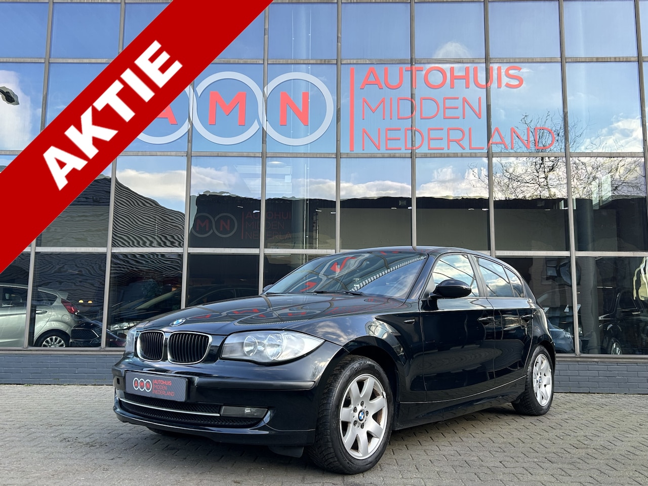 BMW 1-serie - 116i Business Line 2.0L Start/Stopsysteem,Elekpakket,Airco,LMV17” - AutoWereld.nl